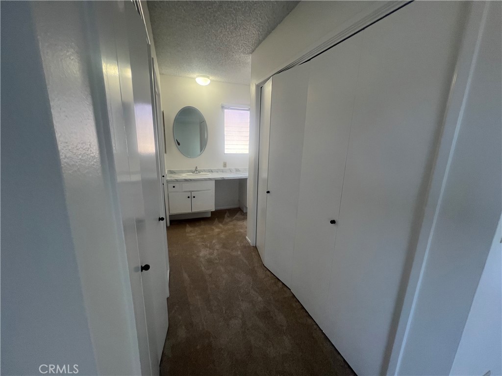 1912 Bataan Road Redondo Beach, CA 90278 - Photo 27 of 37 a bathroom with a sink and a mirror
