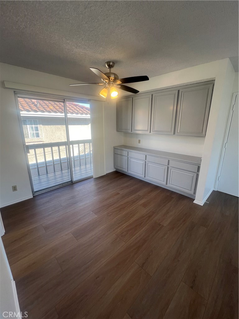1912 Bataan Road Redondo Beach, CA 90278 - Photo 31 of 37 an empty room with windows and chandelier fan