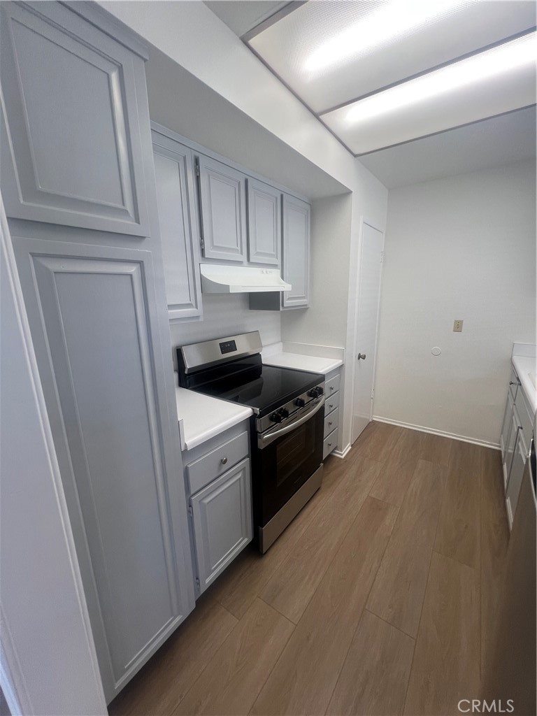 1912 Bataan Road Redondo Beach, CA 90278 - Photo 33 of 37 a kitchen with a sink and a stove top oven