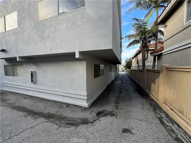 a view of a house with a street