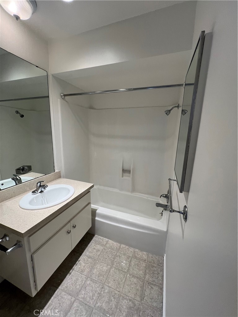 1912 Bataan Road Redondo Beach, CA 90278 - Photo 9 of 37 a bathroom with a tub sink toilet and mirror