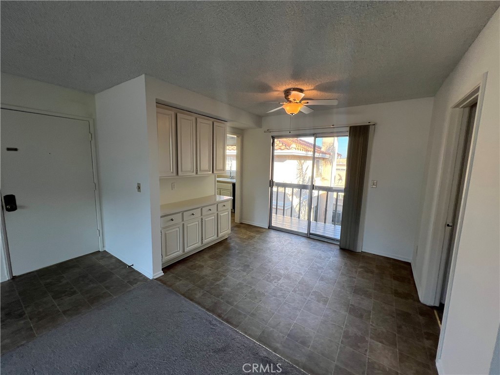 1912 Bataan Road Redondo Beach, CA 90278 - Photo 10 of 37 an empty room with windows and a kitchen view