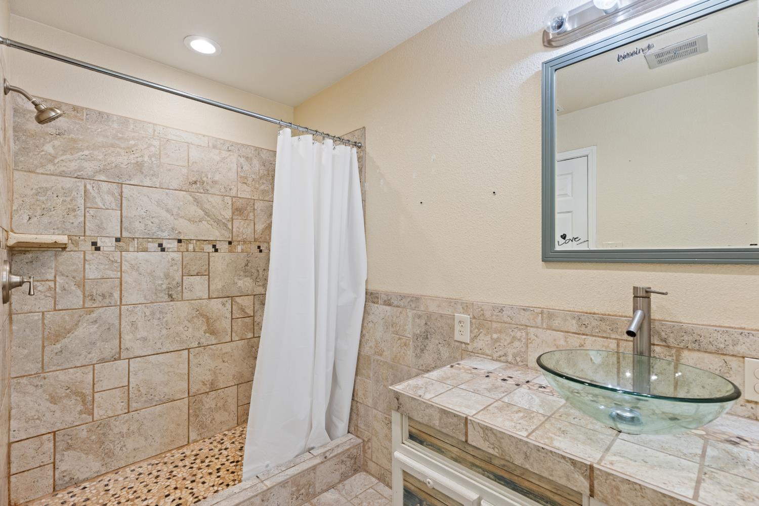 2971 Letitia Avenue Placerville, CA 95667 - Photo 9 of 65 a bathroom with a sink and a mirror