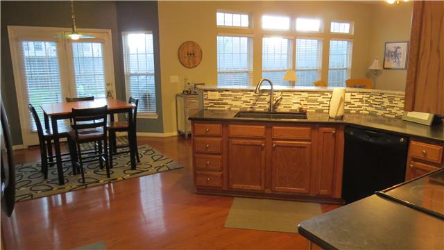 1006 Countess Lane Spring Hill, TN 37174 - Photo 4 of 19 Kitchen with Granite counter tops, Composite Granite Sink, upgraded fixtures