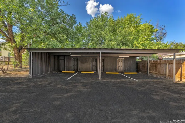 a house with trees in the background