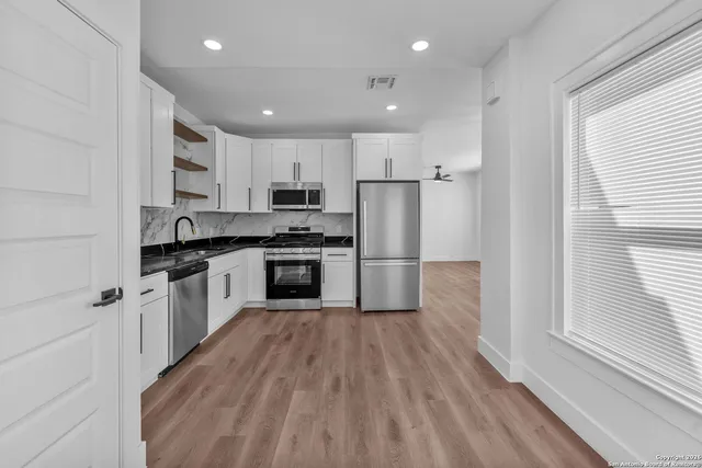 a bathroom with a mirror