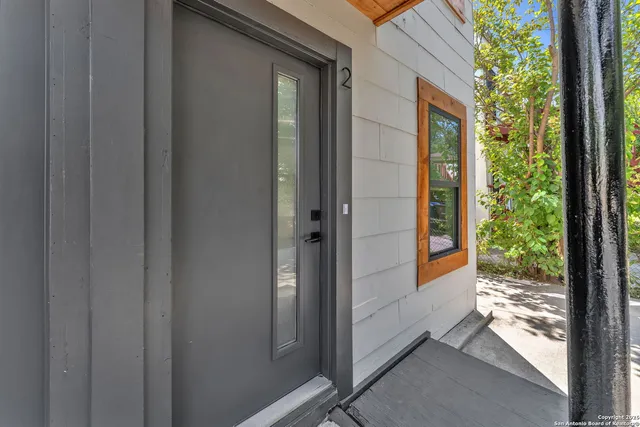 a view of a room that has a large window