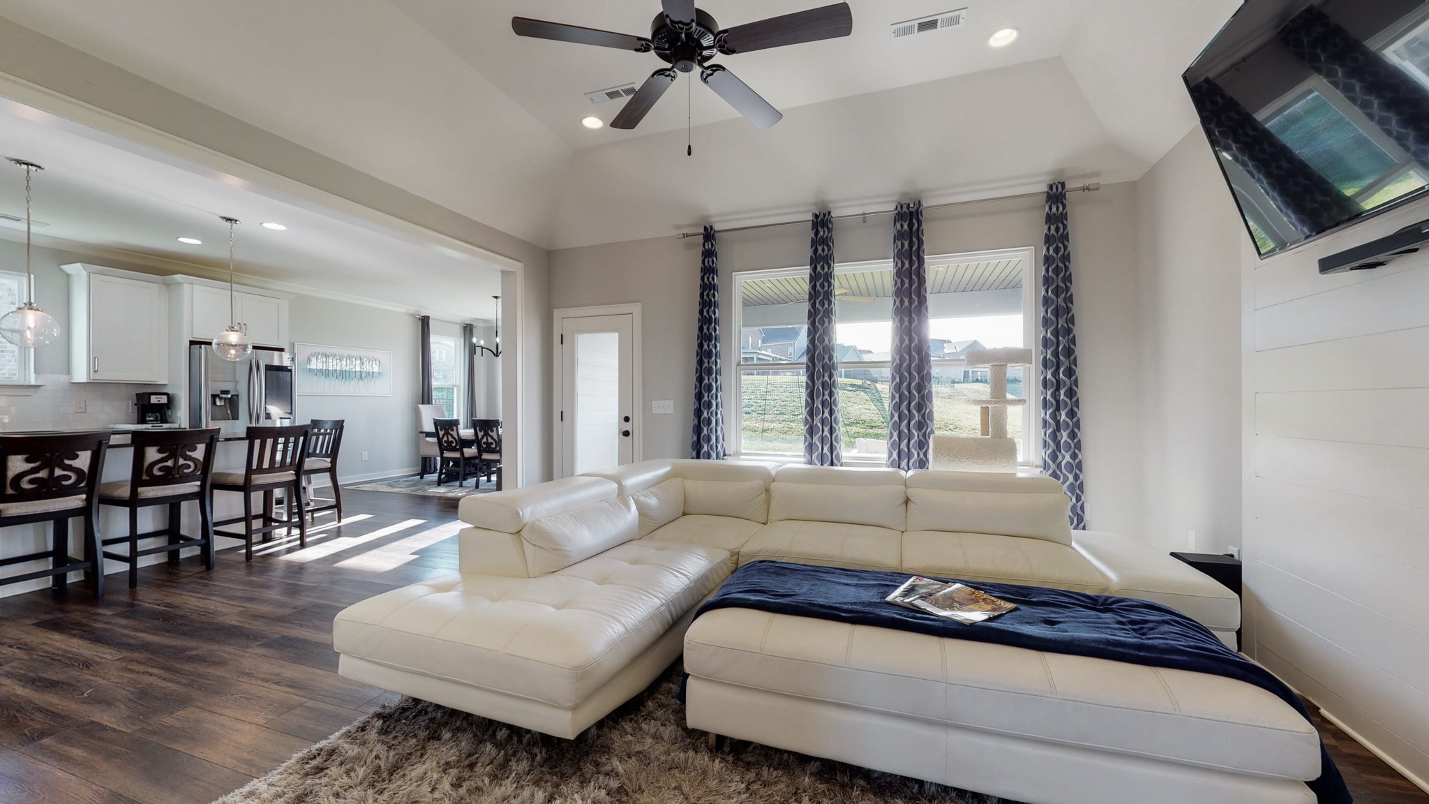 757 Plowson Road Mount Juliet, TN 37122 - Photo 12 of 48 a living room with furniture and a flat screen tv