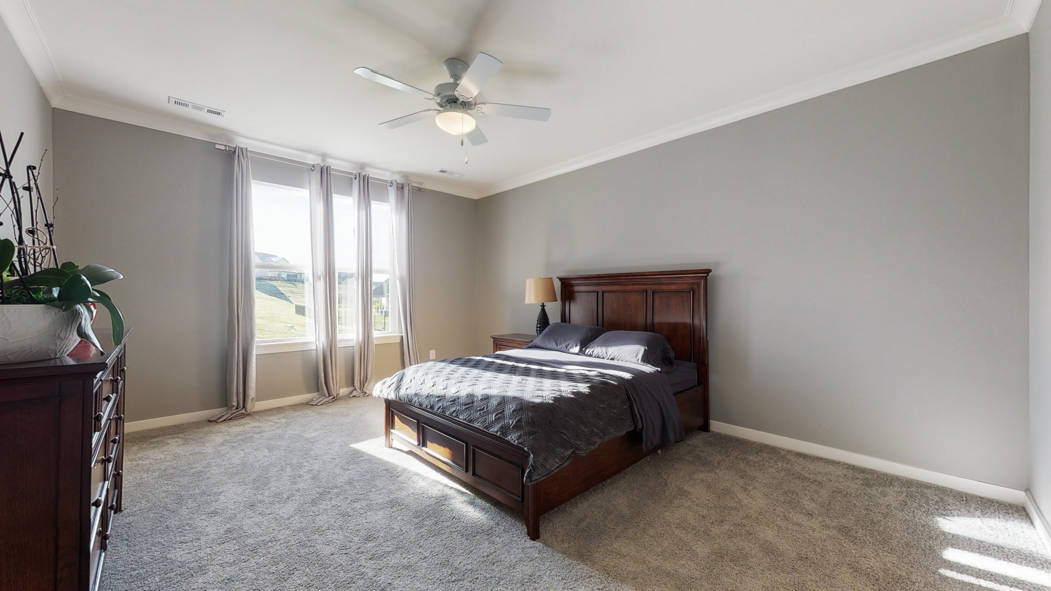 757 Plowson Road Mount Juliet, TN 37122 - Photo 21 of 48 a room with a bed and a chandelier