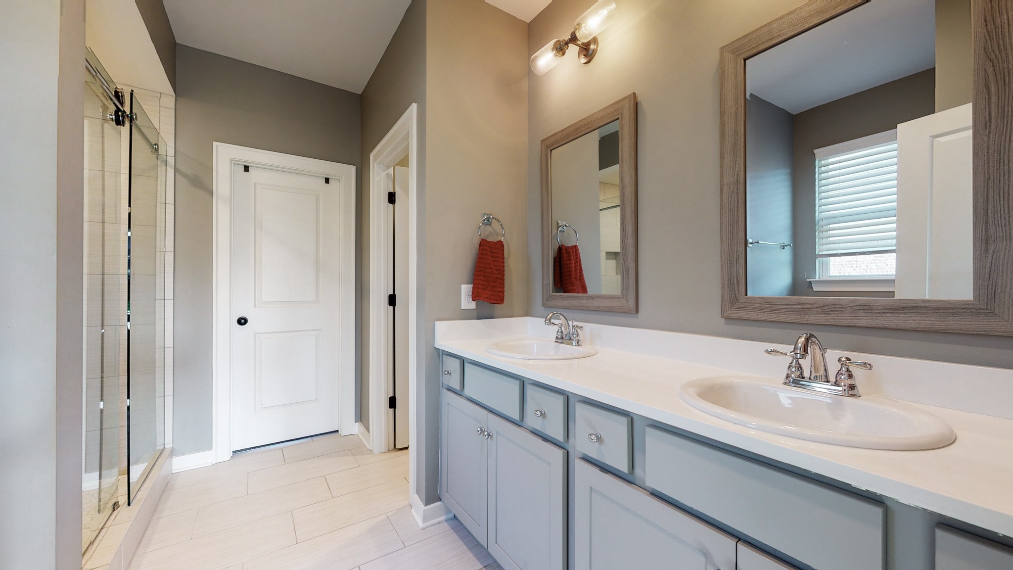 757 Plowson Road Mount Juliet, TN 37122 - Photo 25 of 48 a bathroom with a sink double vanity and a mirror