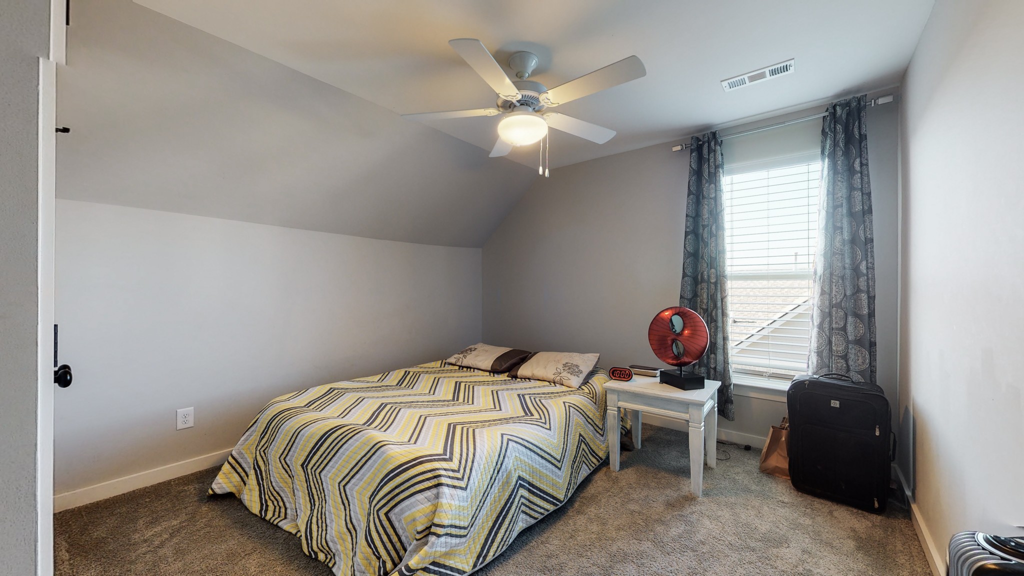 757 Plowson Road Mount Juliet, TN 37122 - Photo 30 of 48 a bedroom with a bed and a window