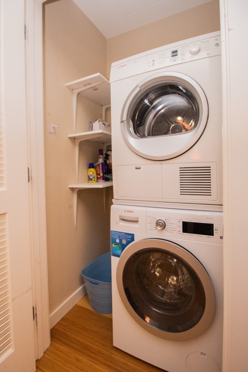 16 Miner Street, Unit 401 Boston, MA 02215 - Photo 24 of 25 a utility room with dryer and washer
