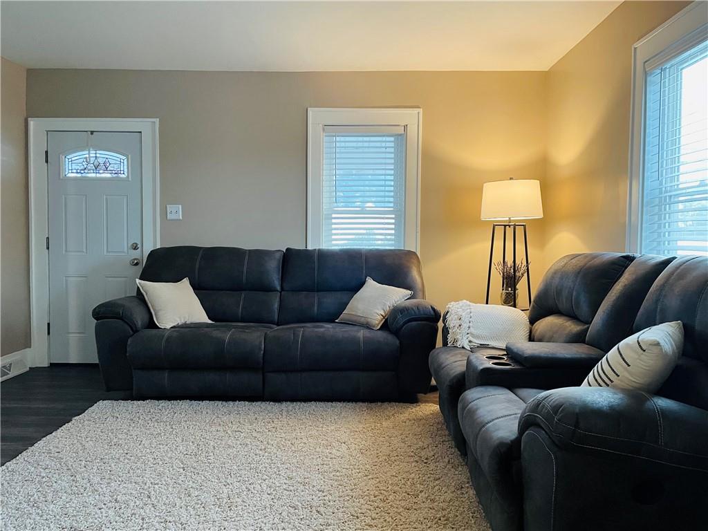 656 Browns Ferry Road Carmichaels, PA 15320 - Photo 13 of 22 a living room with furniture and a lamp