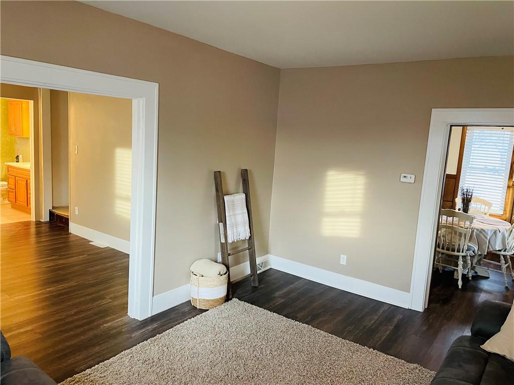 656 Browns Ferry Road Carmichaels, PA 15320 - Photo 14 of 22 a living room with hardwood floor and a ceiling fan
