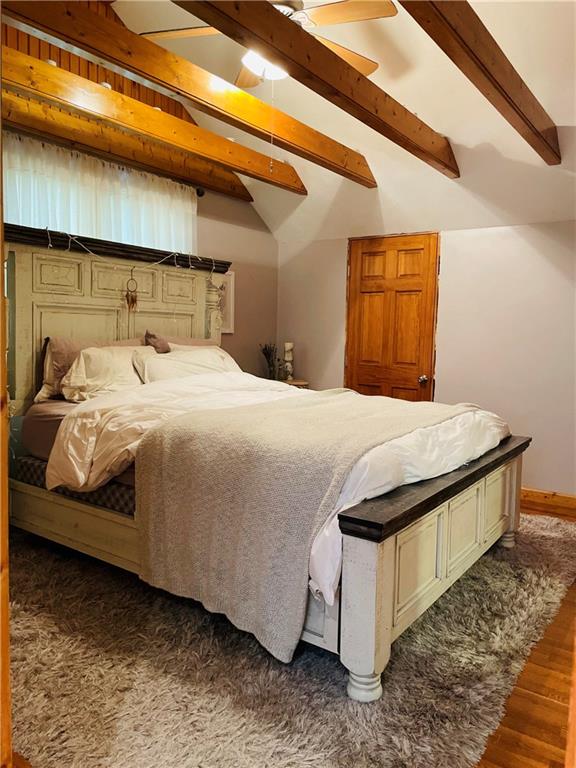 656 Browns Ferry Road Carmichaels, PA 15320 - Photo 18 of 22 a bedroom with a bed and wooden floor