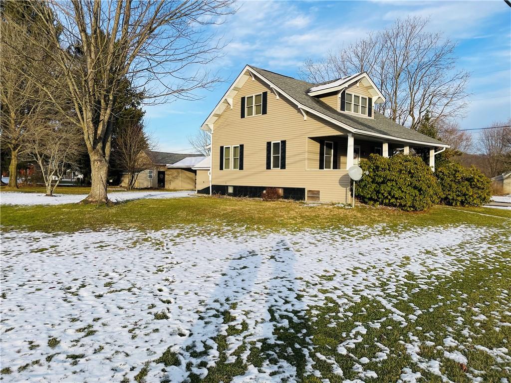 656 Browns Ferry Road Carmichaels, PA 15320 - Photo 2 of 22 a view of a house with a yard