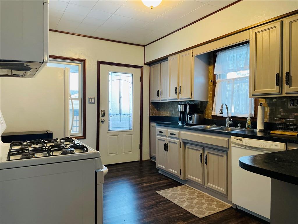 656 Browns Ferry Road Carmichaels, PA 15320 - Photo 6 of 22 a kitchen with stainless steel appliances granite countertop a stove a sink and a refrigerator