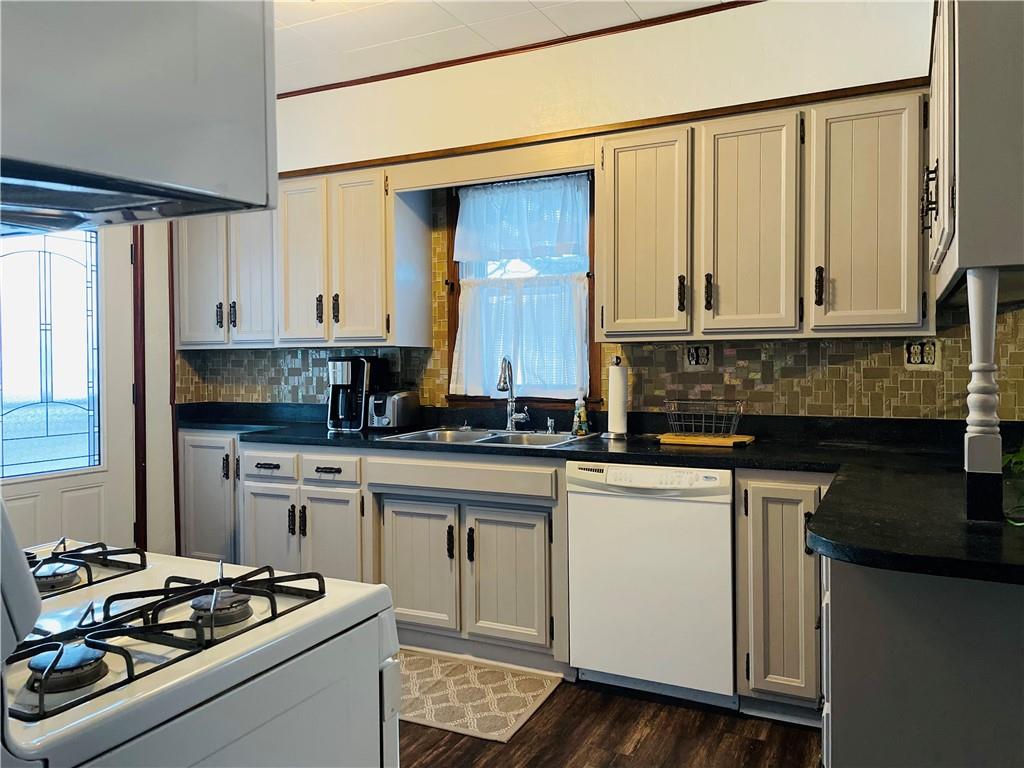 656 Browns Ferry Road Carmichaels, PA 15320 - Photo 7 of 22 a kitchen with stainless steel appliances granite countertop a stove a sink and a refrigerator