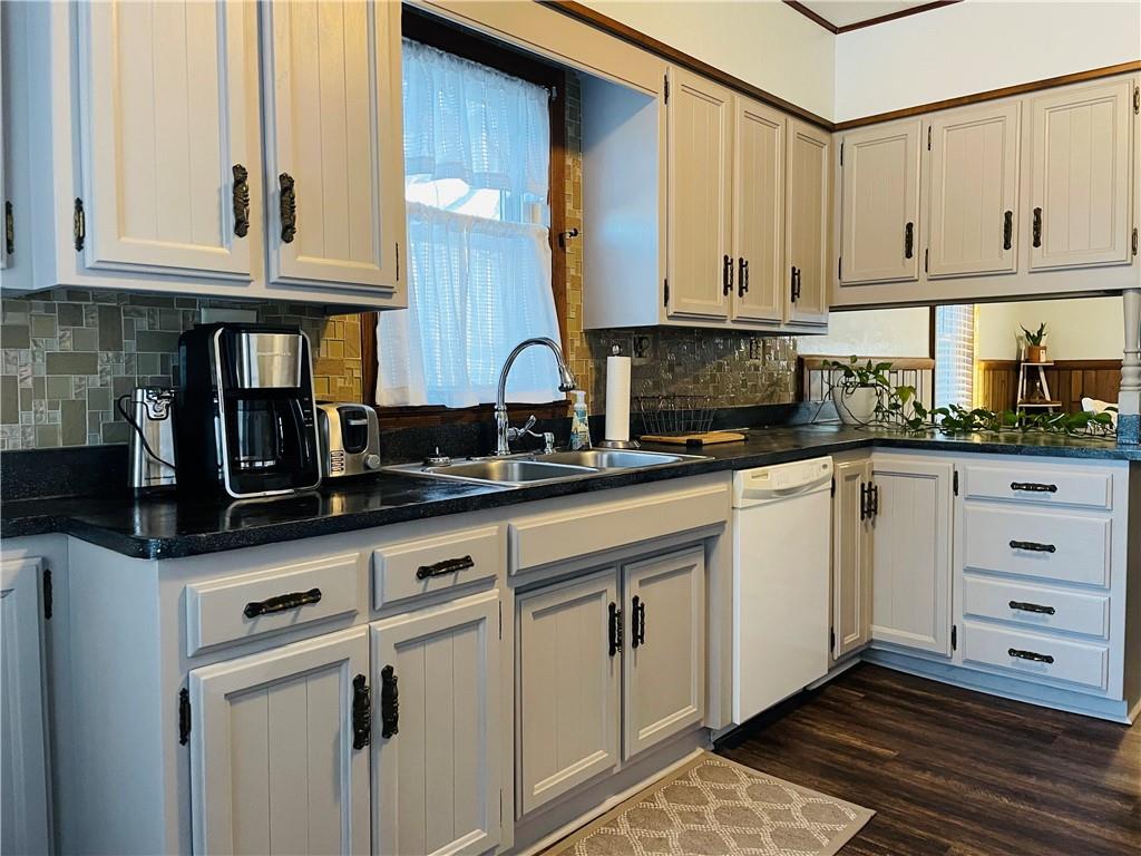656 Browns Ferry Road Carmichaels, PA 15320 - Photo 8 of 22 a kitchen with granite countertop white cabinets and stainless steel appliances