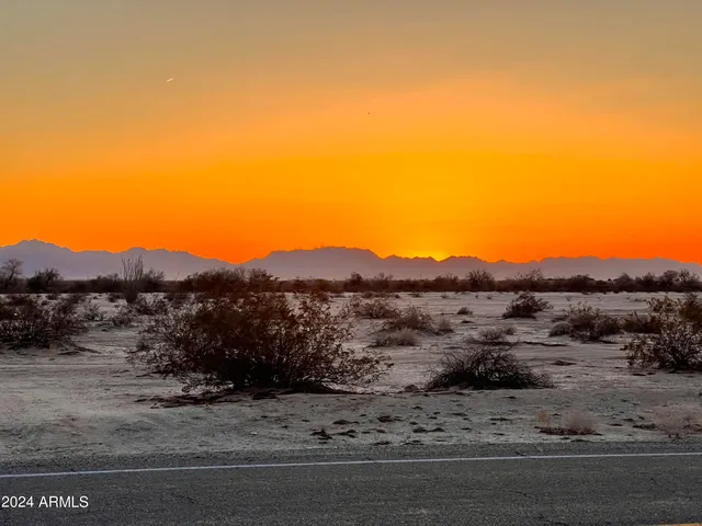 a view of a road with a mountain