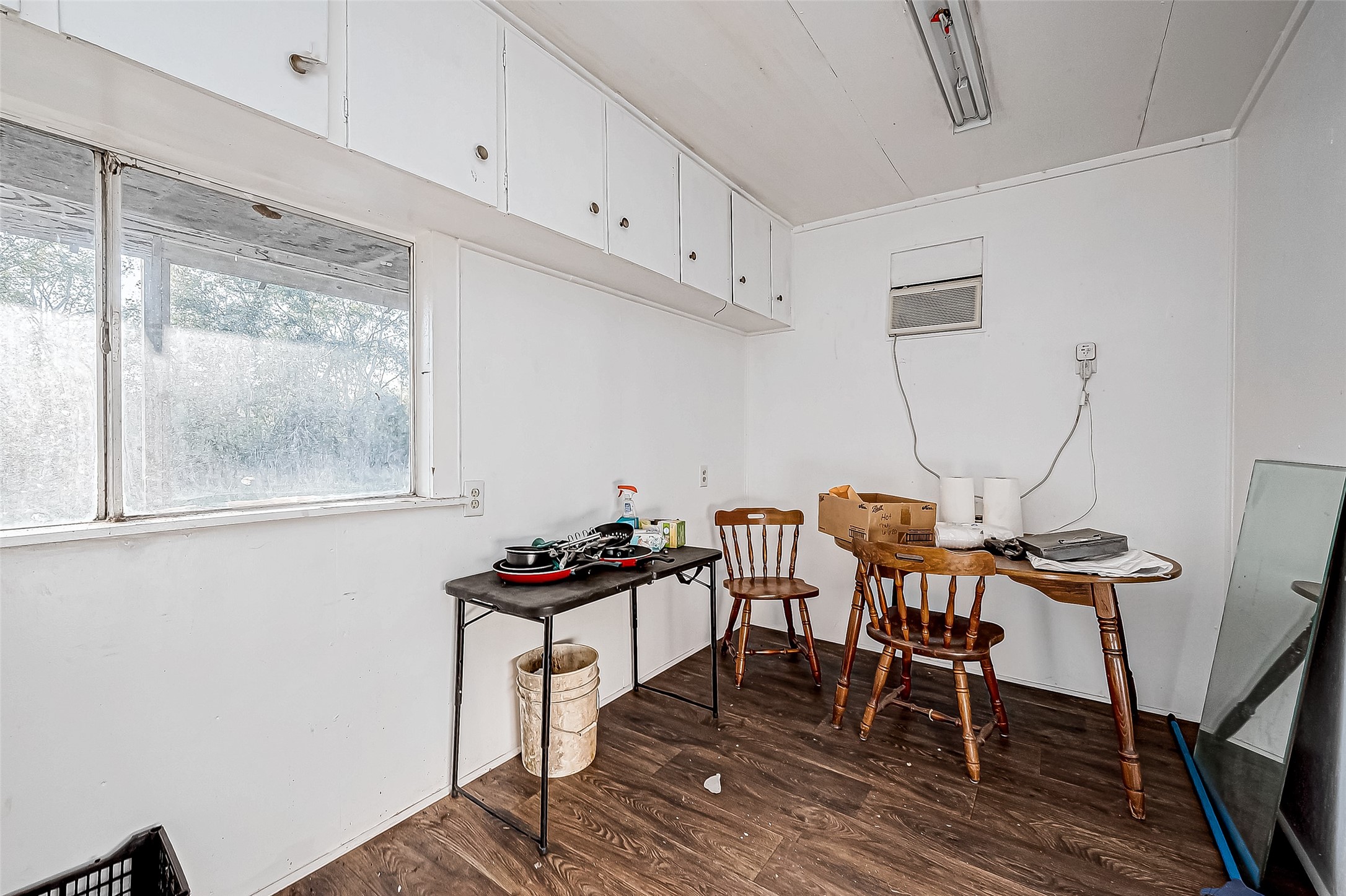 100 Mulcahy Avenue, Unit 264 Damon, TX 77430 - Photo 23 of 30 a view of a workspace with furniture and wooden floor