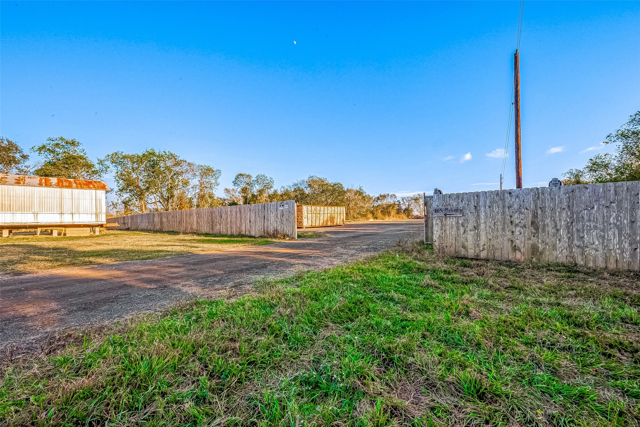 100 Mulcahy Avenue, Unit 264 Damon, TX 77430 - Photo 26 of 30 a view of a yard with an ocean view
