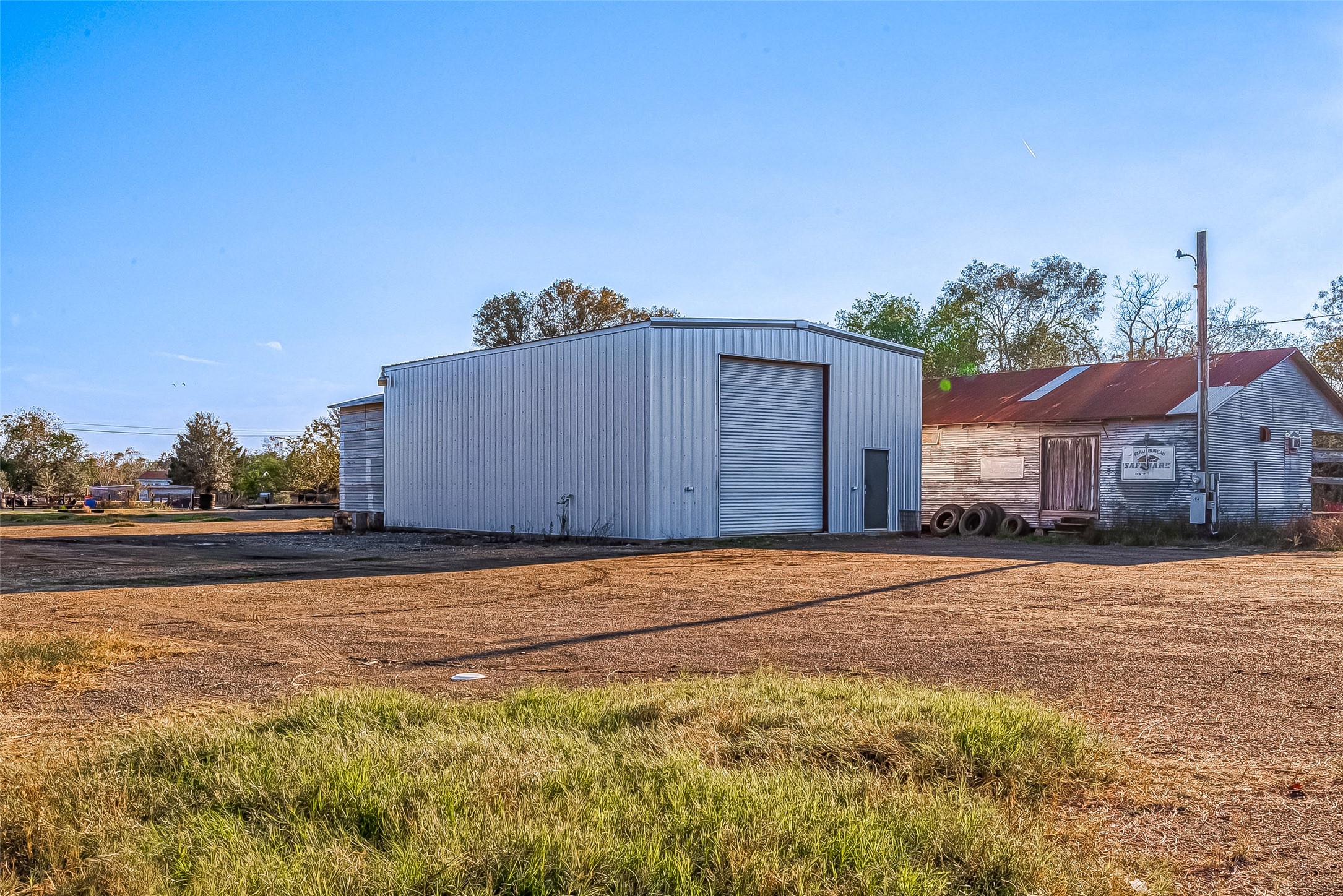 100 Mulcahy Avenue, Unit 264 Damon, TX 77430 - Photo 5 of 30 a front view of a house with a yard and garage