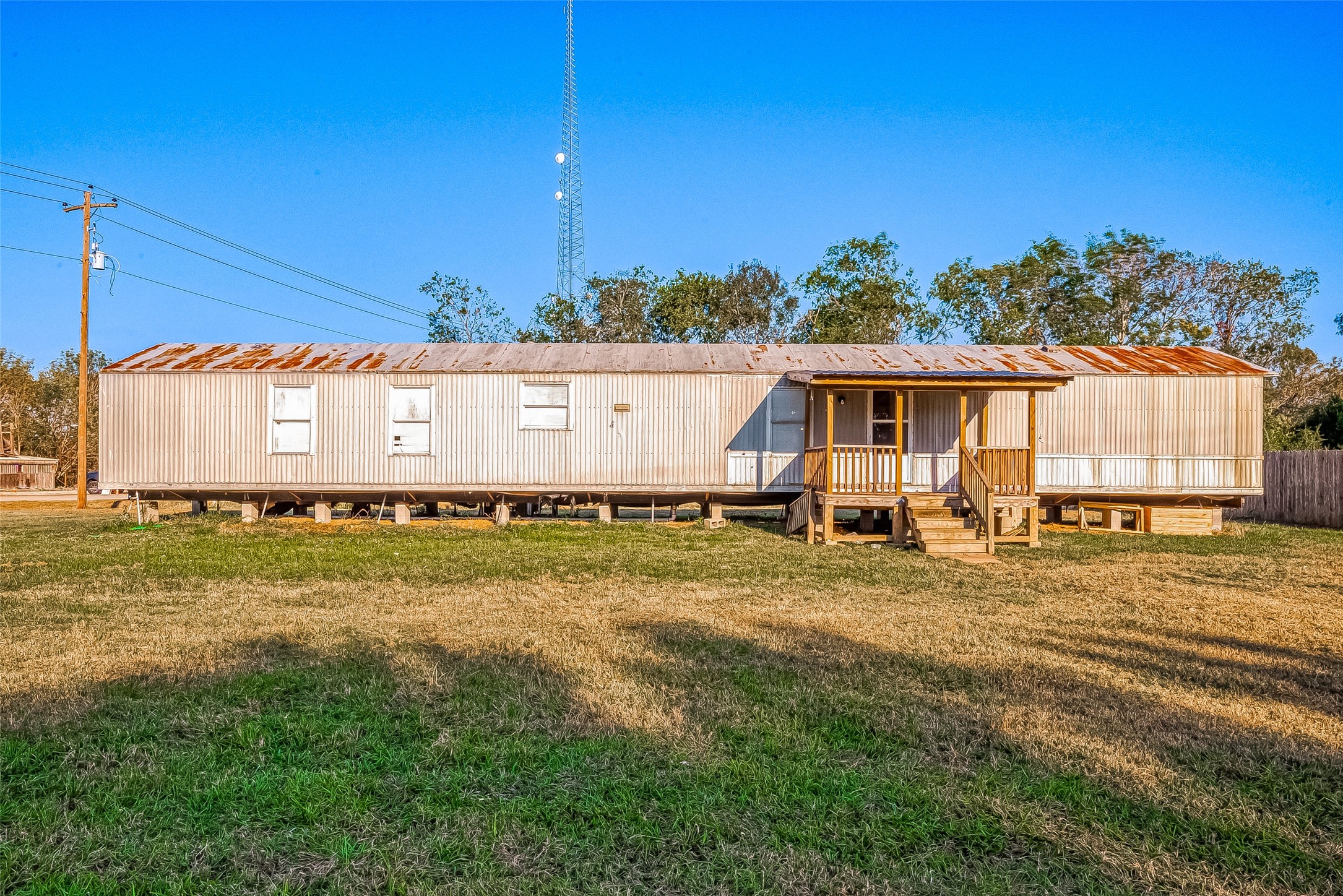 100 Mulcahy Avenue, Unit 264 Damon, TX 77430 - Photo 29 of 30 a view of a house with a yard