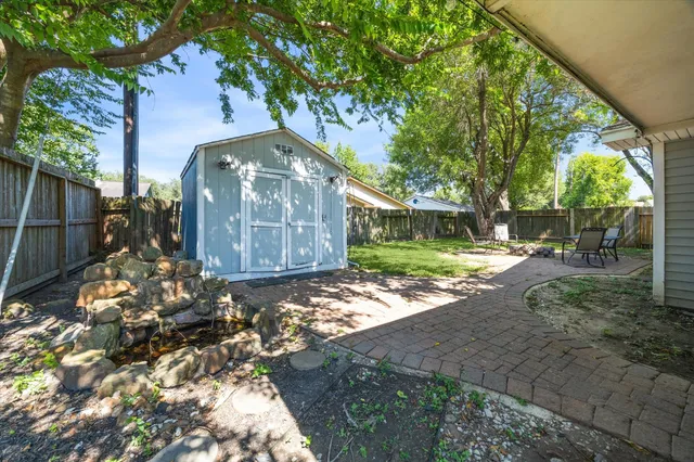 a view of backyard with green space