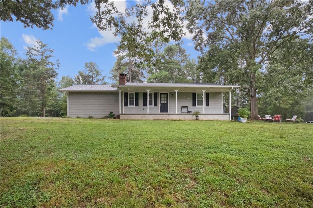 81 Ridge Road Kingston, GA 30145 - Photo 1 of 1 a house view with a garden space