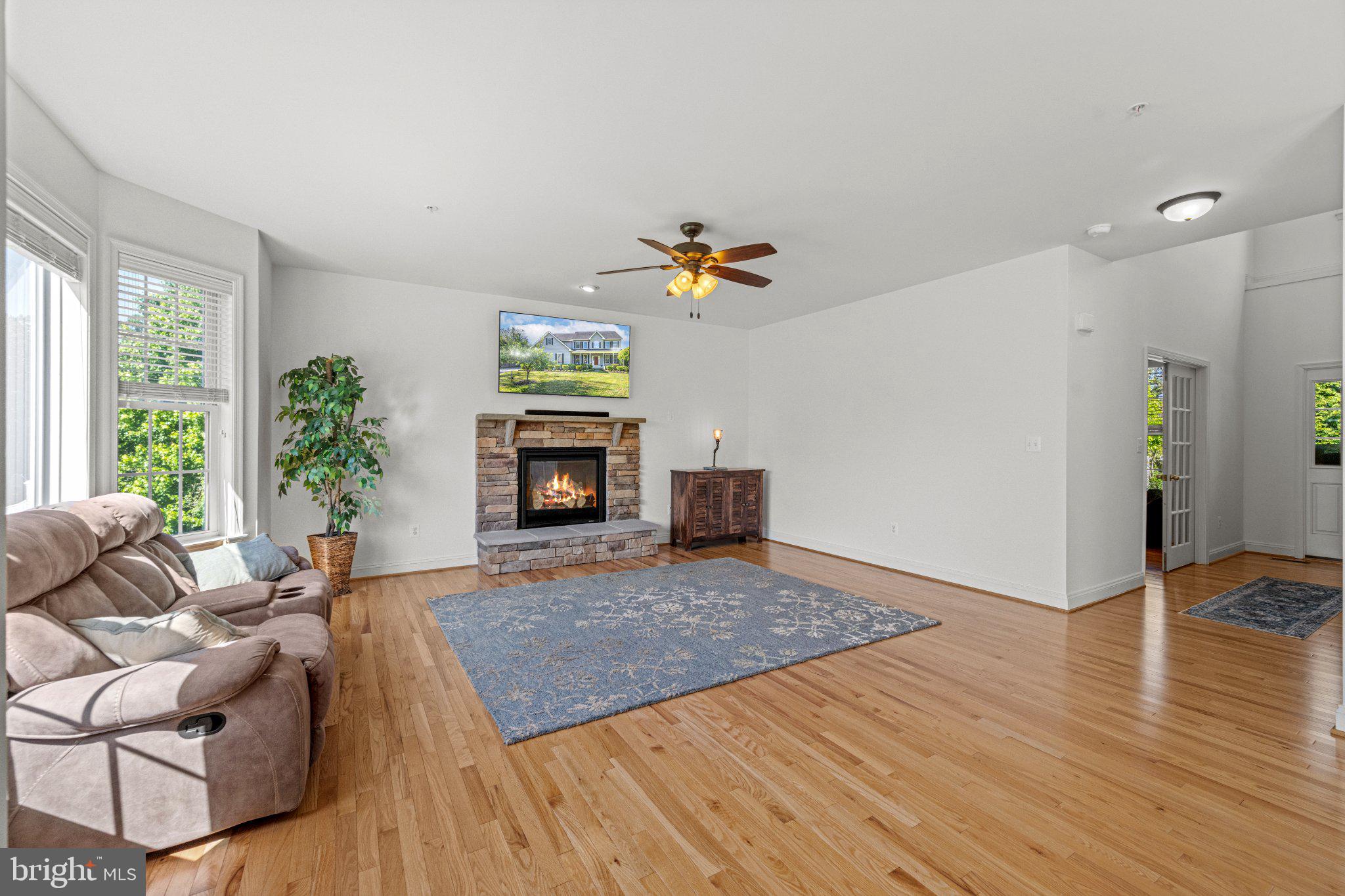 10693 Harding Road Laurel, MD 20723 - Photo 22 of 55 Spacious living area with cozy fireplace.