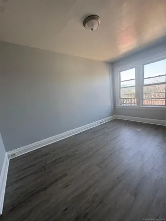 a view of a room with a hallway