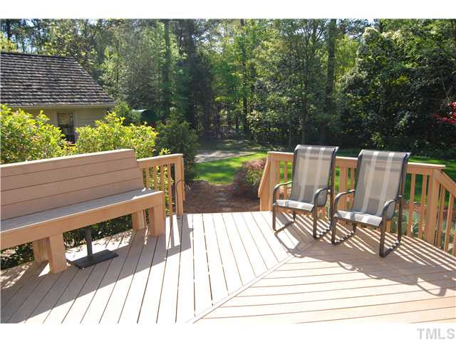 308 Baytree Lane Raleigh, NC 27615 - Photo 10 of 17 Deck features TREX boards and overlooks the private and peaceful setting in the backyard!