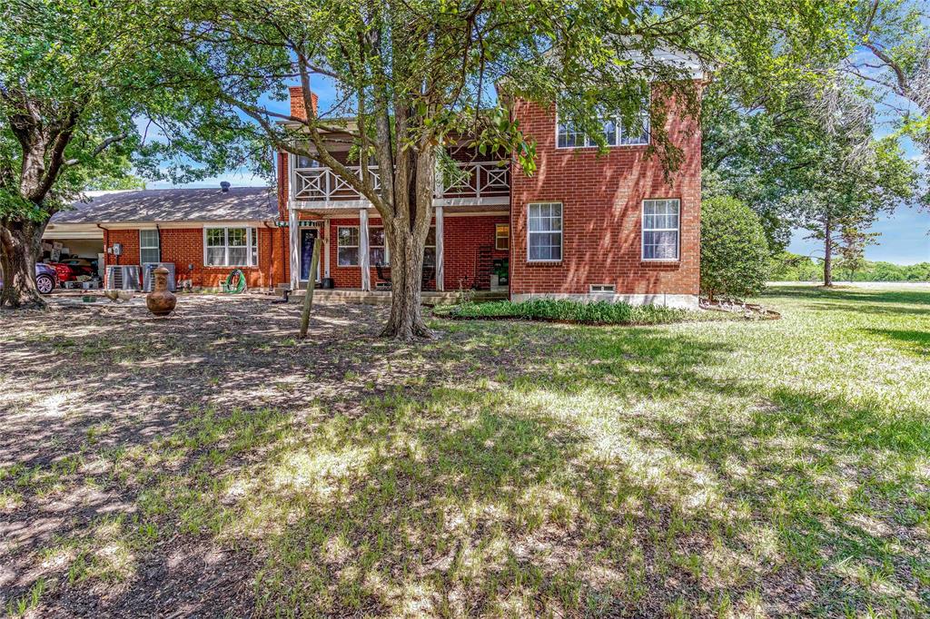 216 McMillen Road Lucas, TX 75002 - Photo 35 of 36 a view of a house with a yard