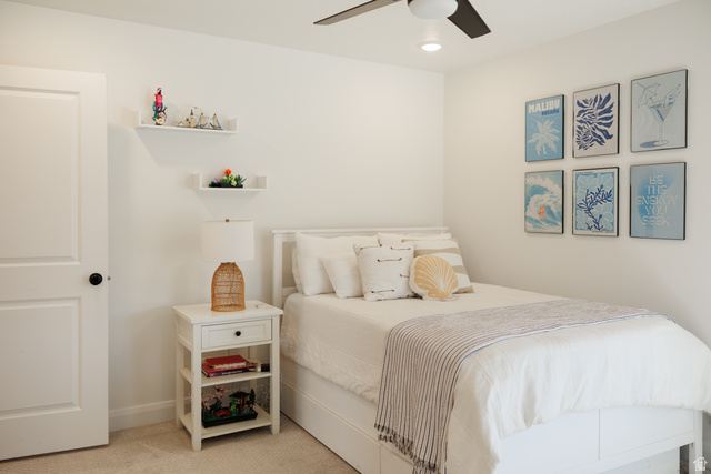 629 Spring Lily Drive St. George, UT 84790 - Photo 23 of 50 Bedroom featuring white walls and neutral carpeting