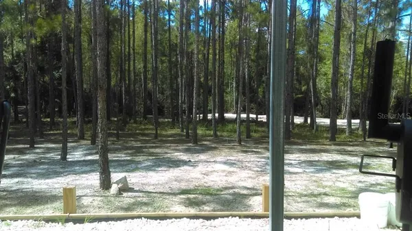 a view of swimming pool from a window