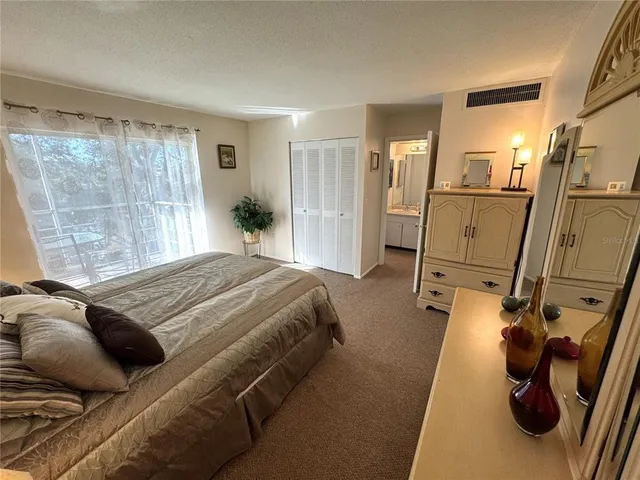 a bathroom with a sink a mirror and a toilet
