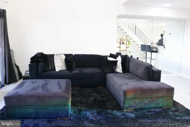 a living room with furniture and a couch