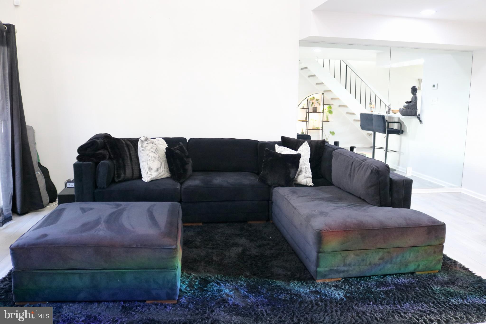 1031 Main Street Voorhees, NJ 08043 - Photo 18 of 32 a living room with furniture and a couch