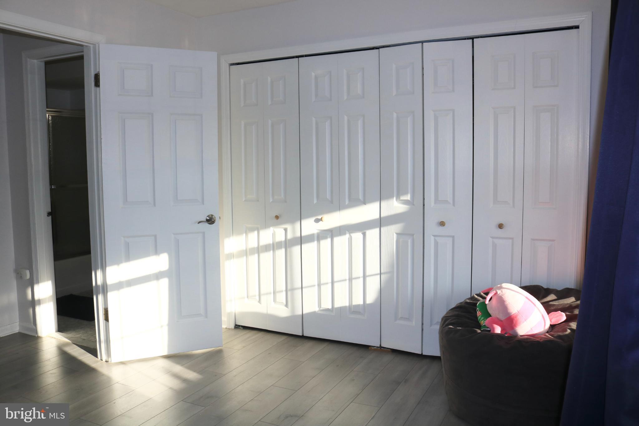 1031 Main Street Voorhees, NJ 08043 - Photo 28 of 32 a view of an empty room with wooden floor