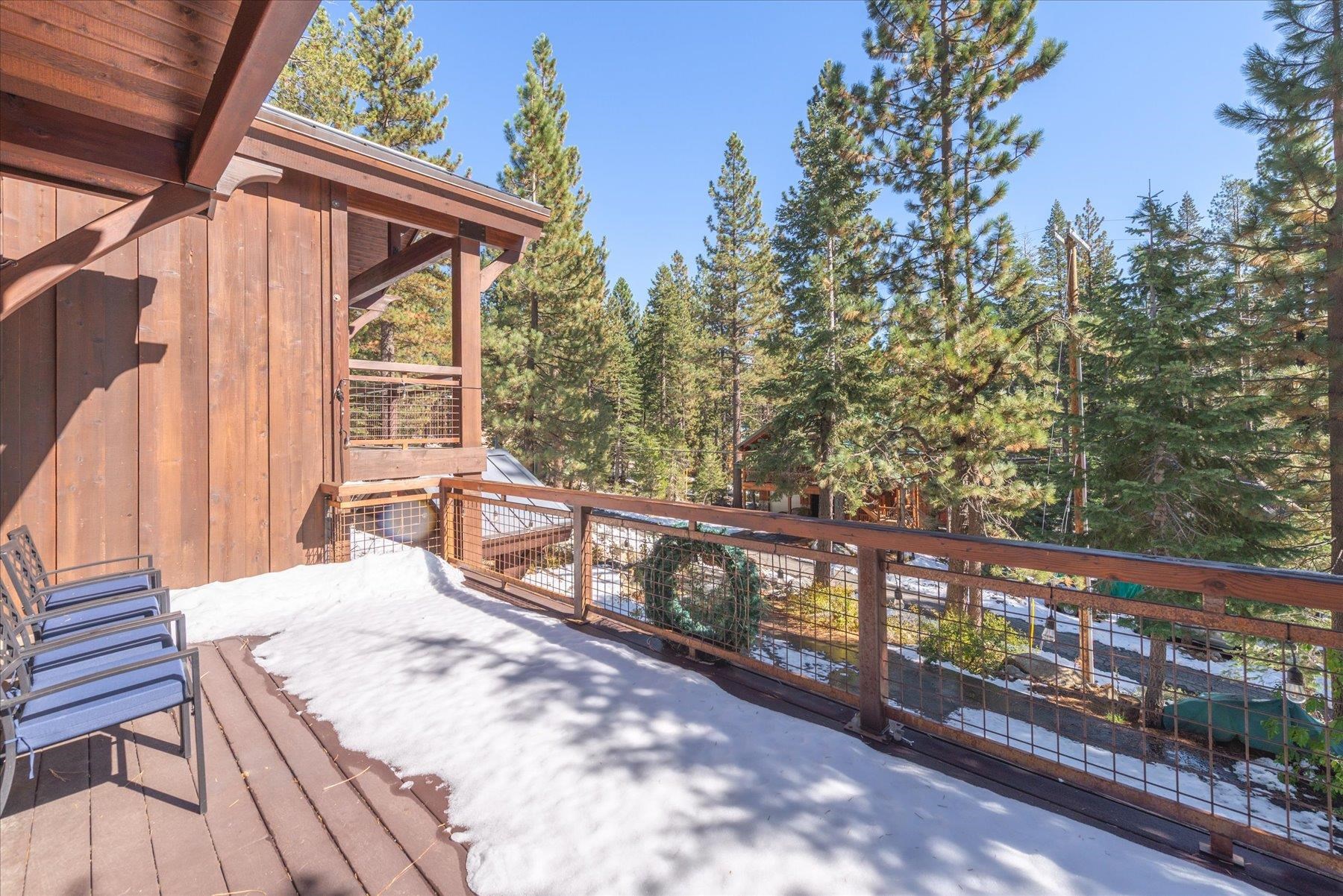 50830 Red Fir Terrace Soda Springs, CA 95728 - Photo 21 of 28 a view of a balcony with wooden floor and outdoor seating