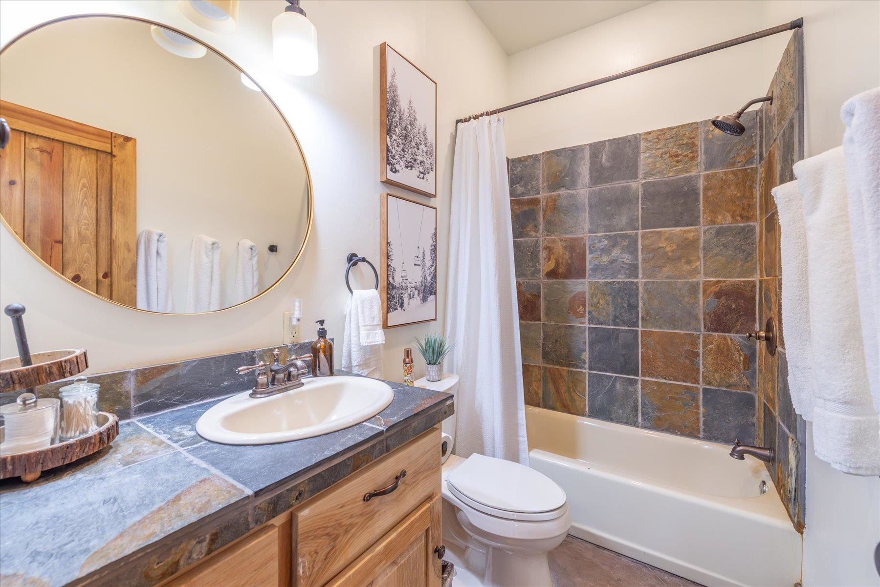 50830 Red Fir Terrace Soda Springs, CA 95728 - Photo 27 of 28 a bathroom with a sink toilet and shower