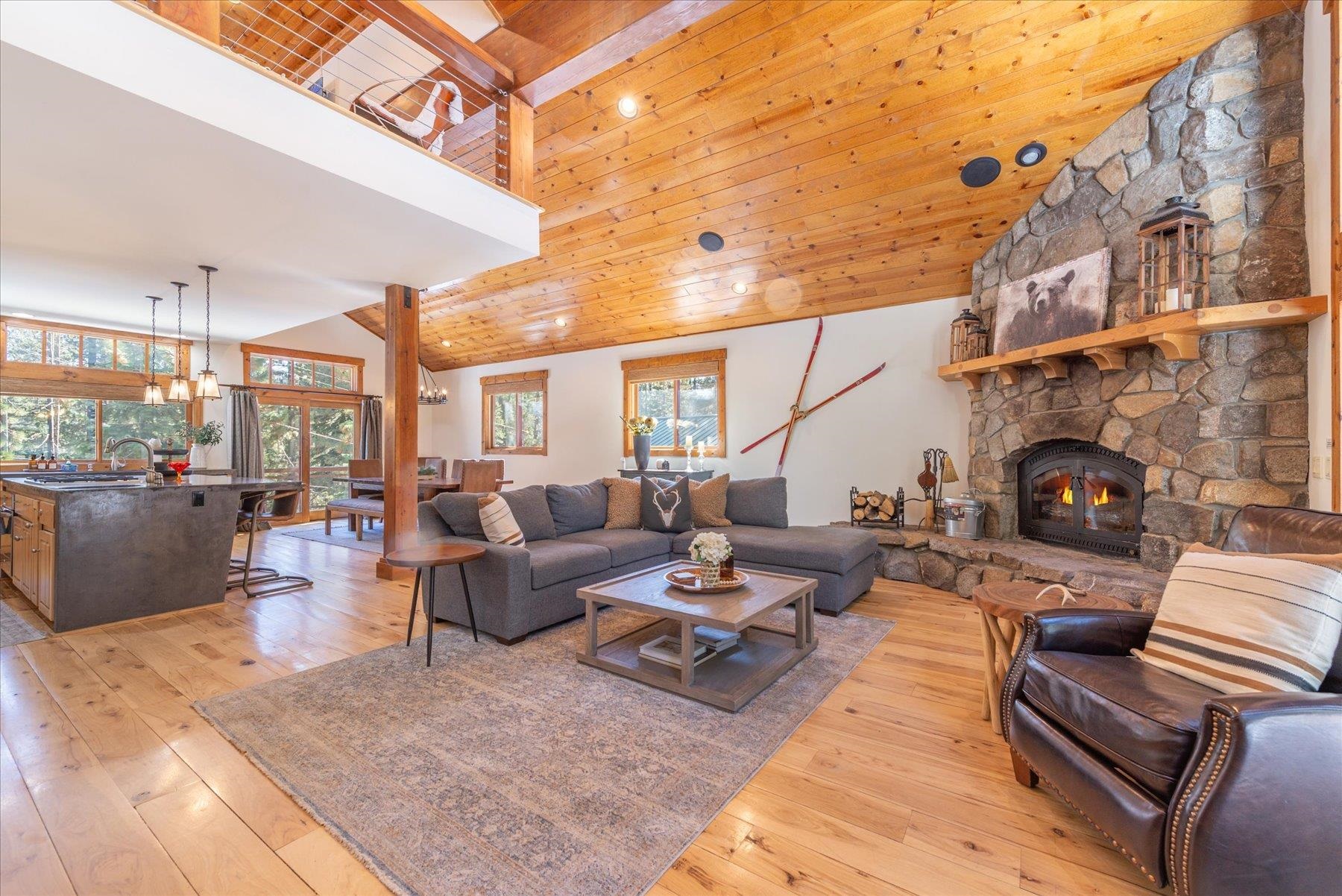 50830 Red Fir Terrace Soda Springs, CA 95728 - Photo 5 of 28 a living room with furniture a fireplace and a table
