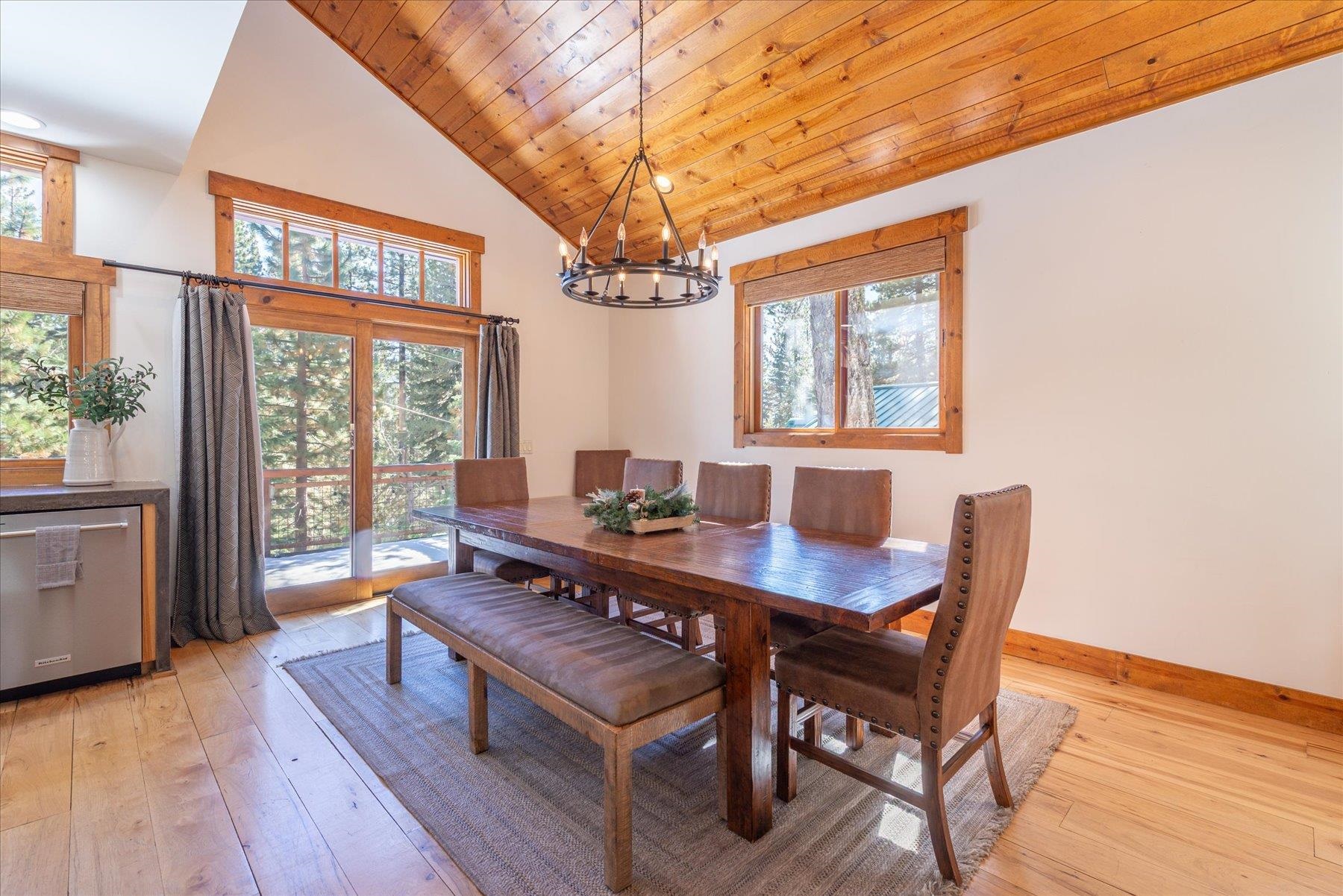 50830 Red Fir Terrace Soda Springs, CA 95728 - Photo 6 of 28 a view of a dining room with furniture window and wooden floor