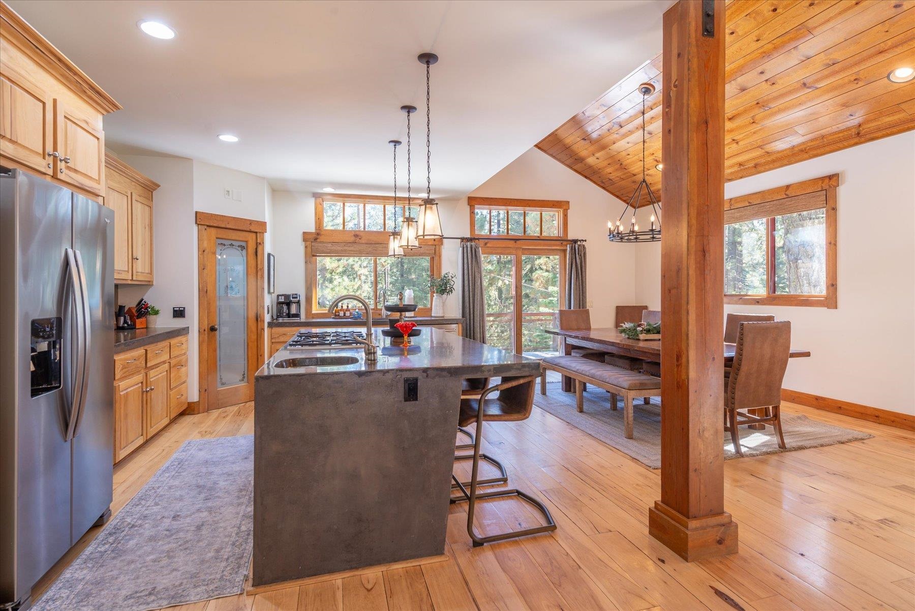 50830 Red Fir Terrace Soda Springs, CA 95728 - Photo 8 of 28 a view of a dining room with furniture window and wooden floor