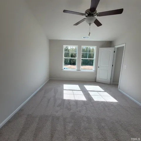a view of empty room with a window