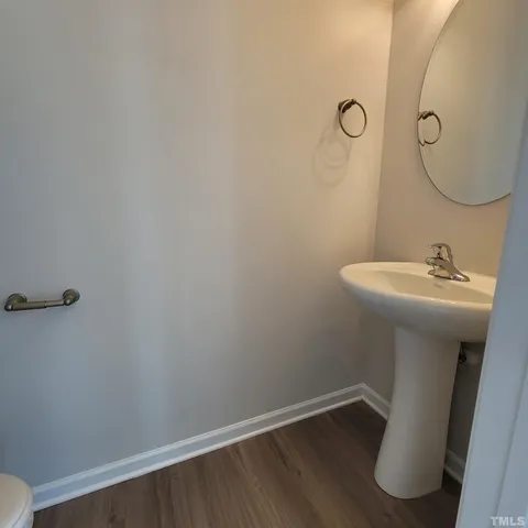 a bathroom with a sink and mirror