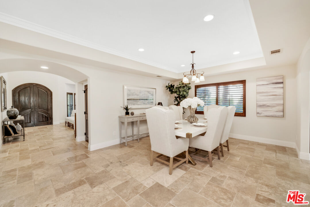 13834 Ordin Ranch Rd Valley Valley Glen, CA 91401 - Photo 13 of 35 a view of a dining room with furniture