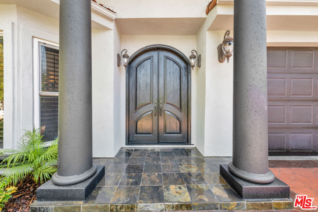 13834 Ordin Ranch Rd Valley Valley Glen, CA 91401 - Photo 31 of 35 a view of a entryway door of the house