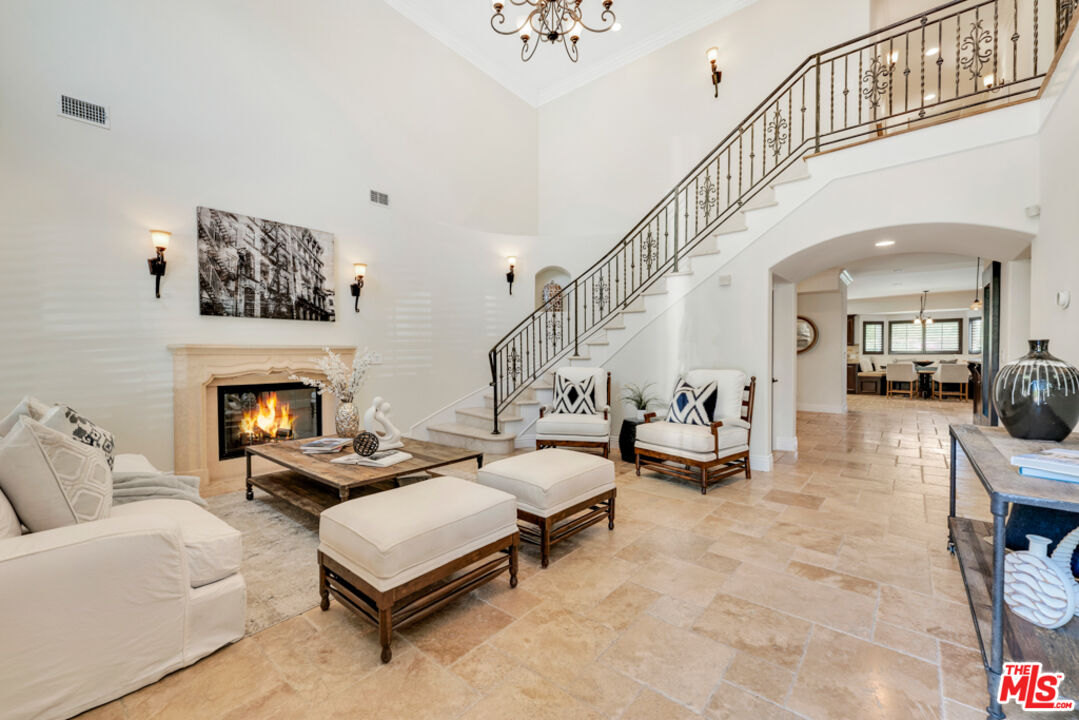 13834 Ordin Ranch Rd Valley Valley Glen, CA 91401 - Photo 6 of 35 a living room with furniture and a fireplace